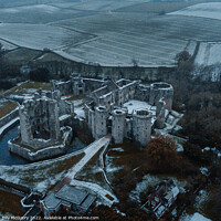Buy canvas prints of Ragaln Castle Wales in the snow by Billy McGarry