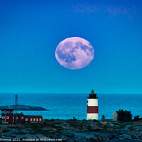 Buy canvas prints of Lighthouse and Moonrise by Ron Thomas