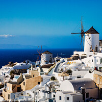 Buy canvas prints of Two Windmills in Oia, Santorini, Greece. by Ron Thomas