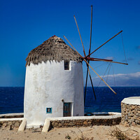 Buy canvas prints of A Windmill in Mykonos by Ron Thomas