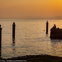 Buy canvas prints of Lake Garda Sunset by Ron Thomas