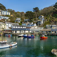 Buy canvas prints of The inner harbour at Polperro in Cornwall by Jim Monk