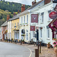 Buy canvas prints of Dunster Village, Somerset by Jim Monk