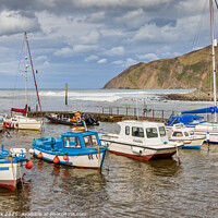 Buy canvas prints of High Tide at Lynmouth Harbour by Jim Monk