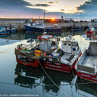 Buy canvas prints of Sunrise at Seahouses Harbour  by Jim Monk