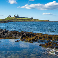 Buy canvas prints of Dunstanburgh Castle Northumberland by Jim Monk
