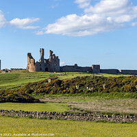 Buy canvas prints of Dunstanburgh Castle in Northumberland by Jim Monk