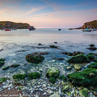 Buy canvas prints of Sunrise at Lulworth Cove  by Jim Monk