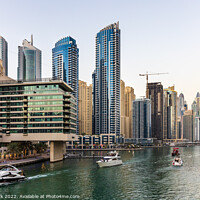 Buy canvas prints of Cruising along in Dubai Marina by Jim Monk