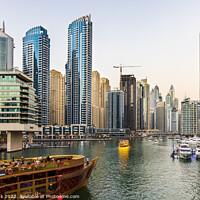 Buy canvas prints of Cruising in Dubai Marina by Jim Monk