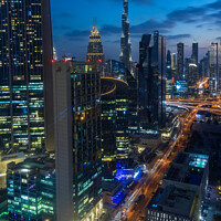 Buy canvas prints of Blue Hour in Downtown Dubai  by Jim Monk