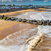 Buy canvas prints of Southwold beach and rock groynes by Jim Monk