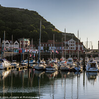 Buy canvas prints of First light at Scarborough Harbour by Jim Monk