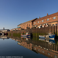 Buy canvas prints of Reflections at Scarborough Harbour by Jim Monk