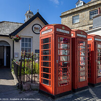 Buy canvas prints of Red Telephone Boxes in Truro by Jim Monk
