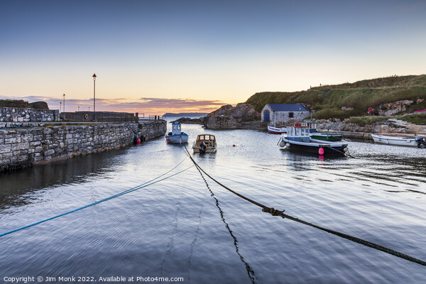 Sunrise at Ballintoy Harbour  Picture Board by Jim Monk