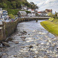 Buy canvas prints of The East Lyn River in Lynmouth by Jim Monk