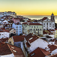 Buy canvas prints of Alfama District at sunrise, Lisbon cityscape by Jim Monk