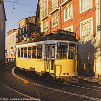 Buy canvas prints of Vintage Tram number 28 in Lisbon by Jim Monk