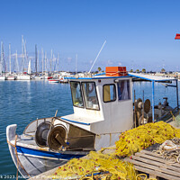 Buy canvas prints of Rethymno Marina in Crete by Jim Monk