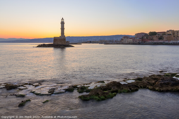 Chania Lighthouse at sunrise Picture Board by Jim Monk