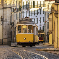 Buy canvas prints of Vintage Yellow Tram in Lisbon by Jim Monk