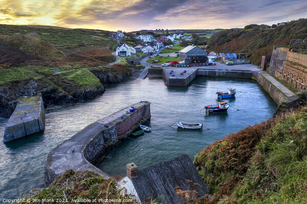 Sunrise over Porthgain Picture Board by Jim Monk