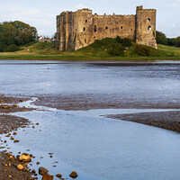 Buy canvas prints of Carew Castle -  Pembrokeshire by Jim Monk