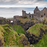 Buy canvas prints of Dunluce Castle, Northern Ireland by Jim Monk