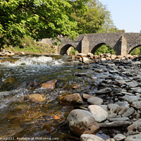 Buy canvas prints of Dipping Bridge over the River Ogmore by Glyn Evans