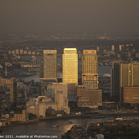 Buy canvas prints of Canary Wharf in Golden Light by Kevin Allen