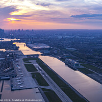Buy canvas prints of Sunset over City Airport, London. by Kevin Allen