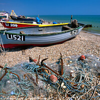 Buy canvas prints of Boats and fishing tackle on beach, Bognor Regis, West Sussex, UK by Geraint Tellem ARPS