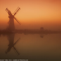 Buy canvas prints of Misty winter dawn over Thurne Mill, Norfolk Broads, UK by Geraint Tellem ARPS