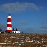Buy canvas prints of Happisburgh Lighthouse in winter, North Norfolk UK by Geraint Tellem ARPS