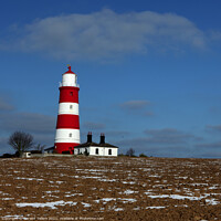 Buy canvas prints of Happisburgh Lighthouse in winter, North Norfolk UK by Geraint Tellem ARPS