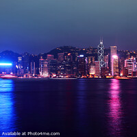 Buy canvas prints of Hong Kong Island, Victoria Harbour waterfront including Hong Kong Convention and Exhibition Centre, and Central Plaza during A Symphony of Lights display. by Geraint Tellem ARPS