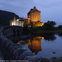 Buy canvas prints of Eilean Donan Castle at night. by ANN RENFREW