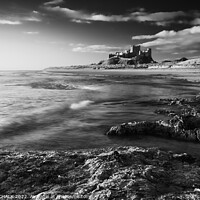 Buy canvas prints of Black and white picture of Bamburgh castle on the Northumberland coast 740 by PHILIP CHALK
