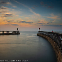 Buy canvas prints of Whitby piers at sunset 785 by PHILIP CHALK