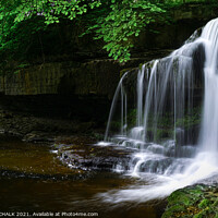 Buy canvas prints of Dreamy Cauldron force waterfall in the village of West Burton Yorkshire dales.  by PHILIP CHALK