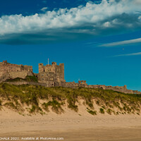 Buy canvas prints of Bamburgh Castle Northumberland from the sandy beach 330 by PHILIP CHALK