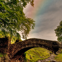 Buy canvas prints of Rainbow over Eastergate Bridge, Marsden. by Jeni Harney