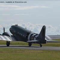 Buy canvas prints of Powerful Dakota Taking to the Skies by Mark Chesters