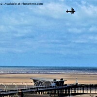 Buy canvas prints of Lancaster flying over Southport pier. by Mark Chesters