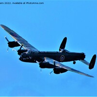 Buy canvas prints of Majestic Avro Lancaster Soars over Southport by Mark Chesters