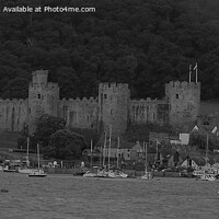 Buy canvas prints of Majestic Conwy Castle in Monochrome by Mark Chesters