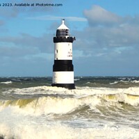 Buy canvas prints of Majestic Penmon Lighthouse in Turbulent Seas by Mark Chesters