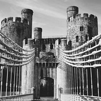 Buy canvas prints of Conwy castle and toll bridge Black and White by Mark Chesters