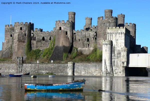 Conwy Castle and boats on a February day Picture Board by Mark Chesters